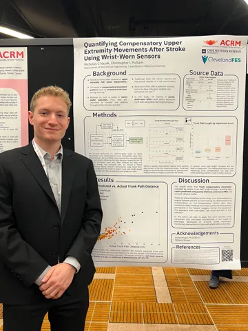 Nick Nazak with his poster at RehabWeek 2025